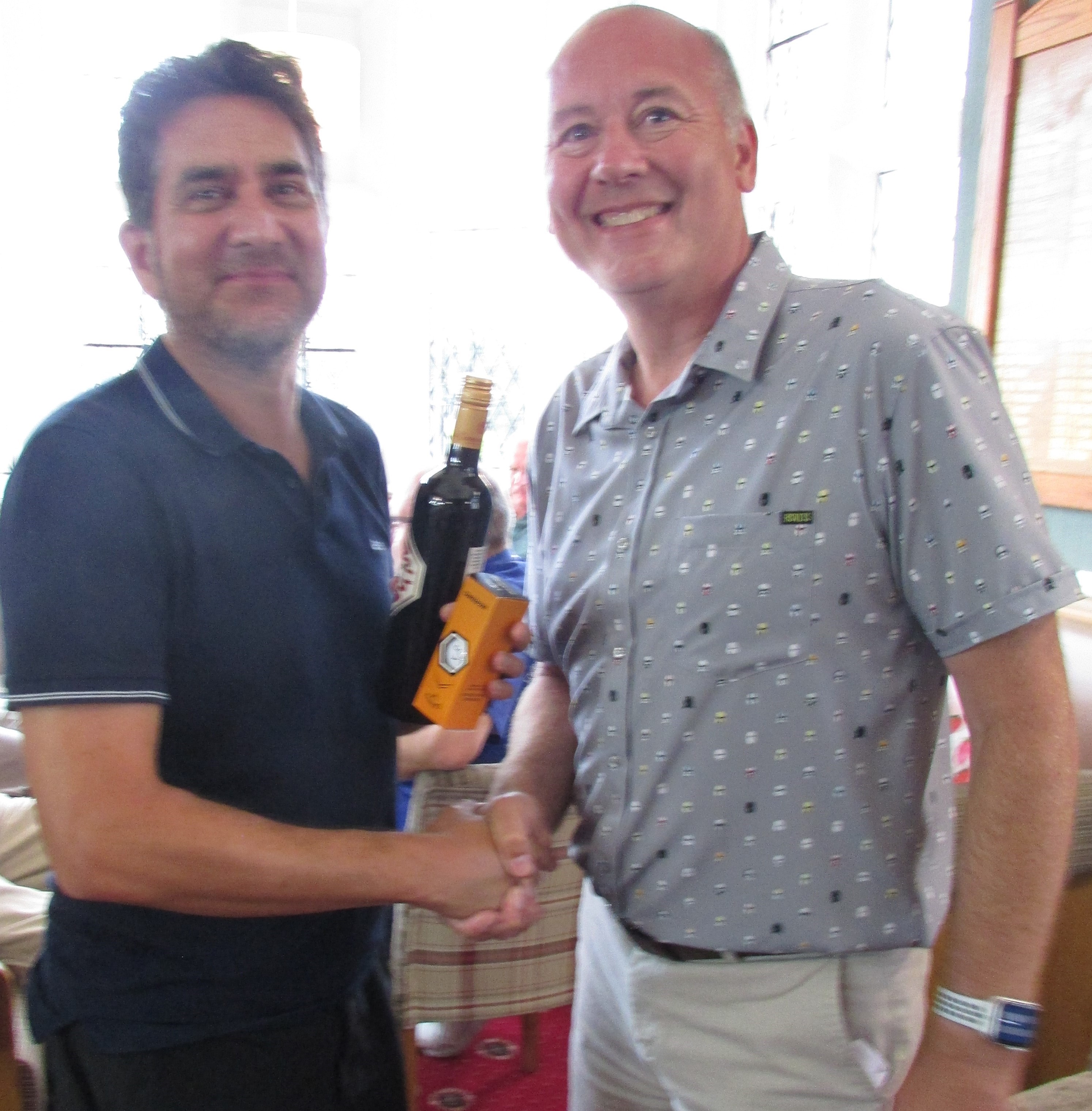 Winner awaiting photo